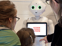 Pepper robot at the Cité des Sciences et de l’Industrie reception desk